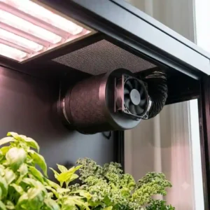 Internal view of an indoor grow box showing the carbon filter and ventilation fan system.